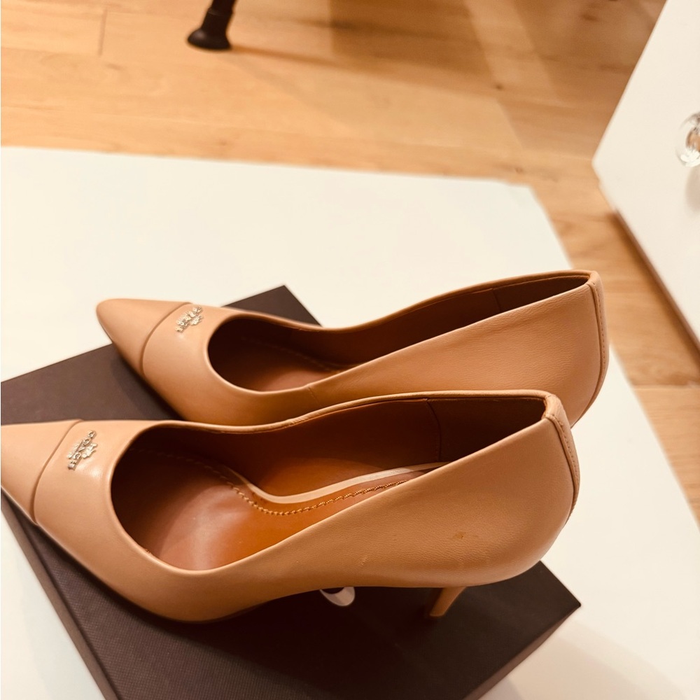 Coach beige heels. Brand we, never worn